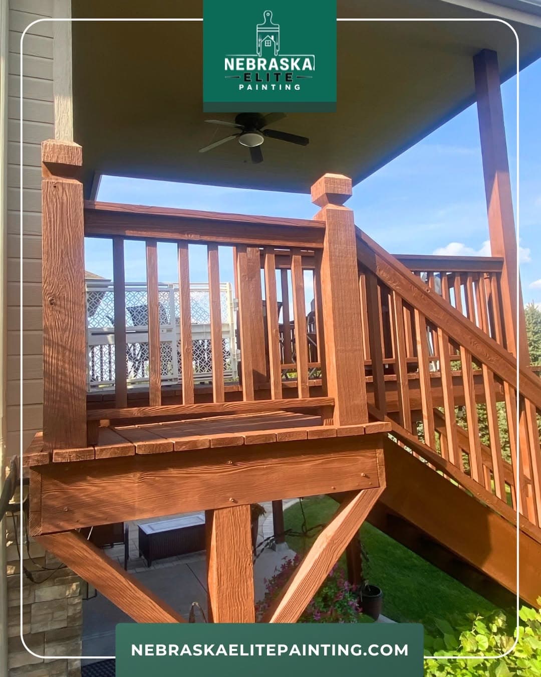 Wooden deck with railing, freshly stained and painted, showcasing craftsmanship and outdoor space.