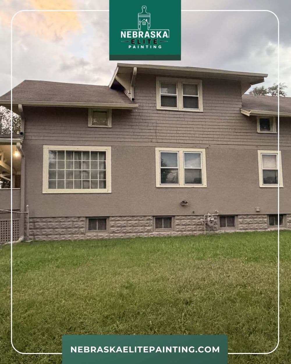 Exterior view of a professionally painted home by Nebraska Elite Painting, showcasing quality work.