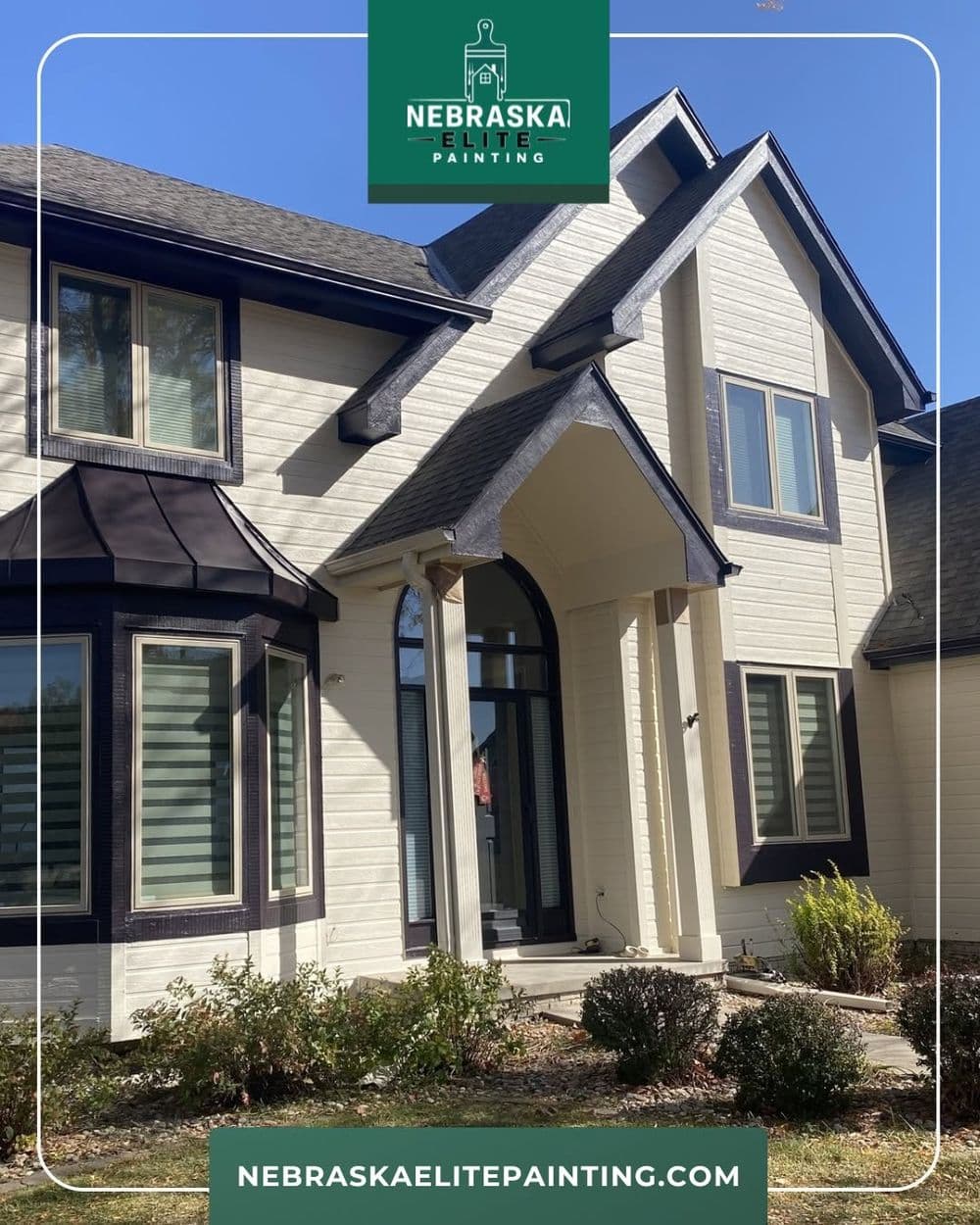 Modern home exterior with fresh paint by Nebraska Elite Painting, showcasing elegant design.