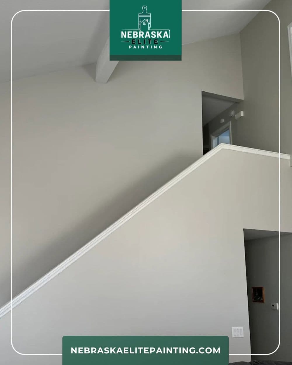 Modern staircase in a freshly painted light gray interior, showcasing clean lines and elegance.