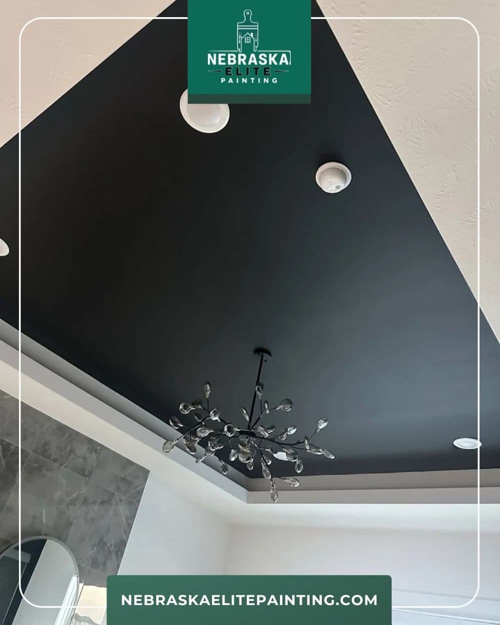 Modern black ceiling with elegant chandelier by Nebraska Elite Painting.