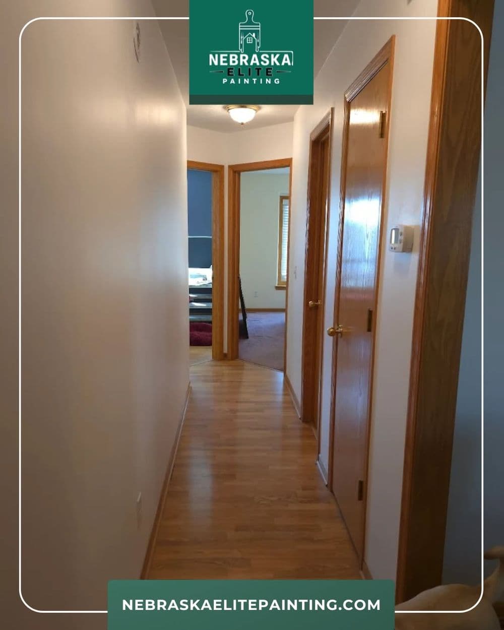 Hallway with polished wooden floors and doorways leading to adjacent rooms, illuminated by natural light.