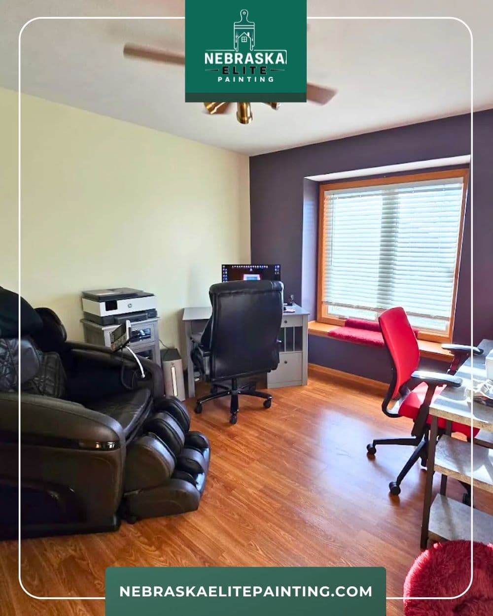Modern home office setup with ergonomic chair, printer, and large window for natural light.