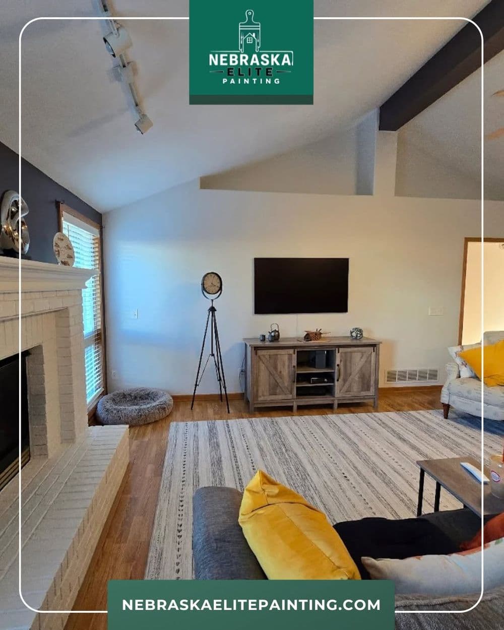 Modern living room with neutral tones, stylish decor, and a cozy ambiance. Nebraska Elite Painting.